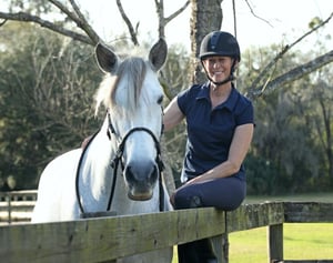 Karen Rohlf Dressage Naturally sitting on fence with natilla